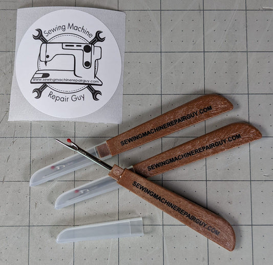 Three seam rippers and one logo sticker for Sewing Machine Repair Guy